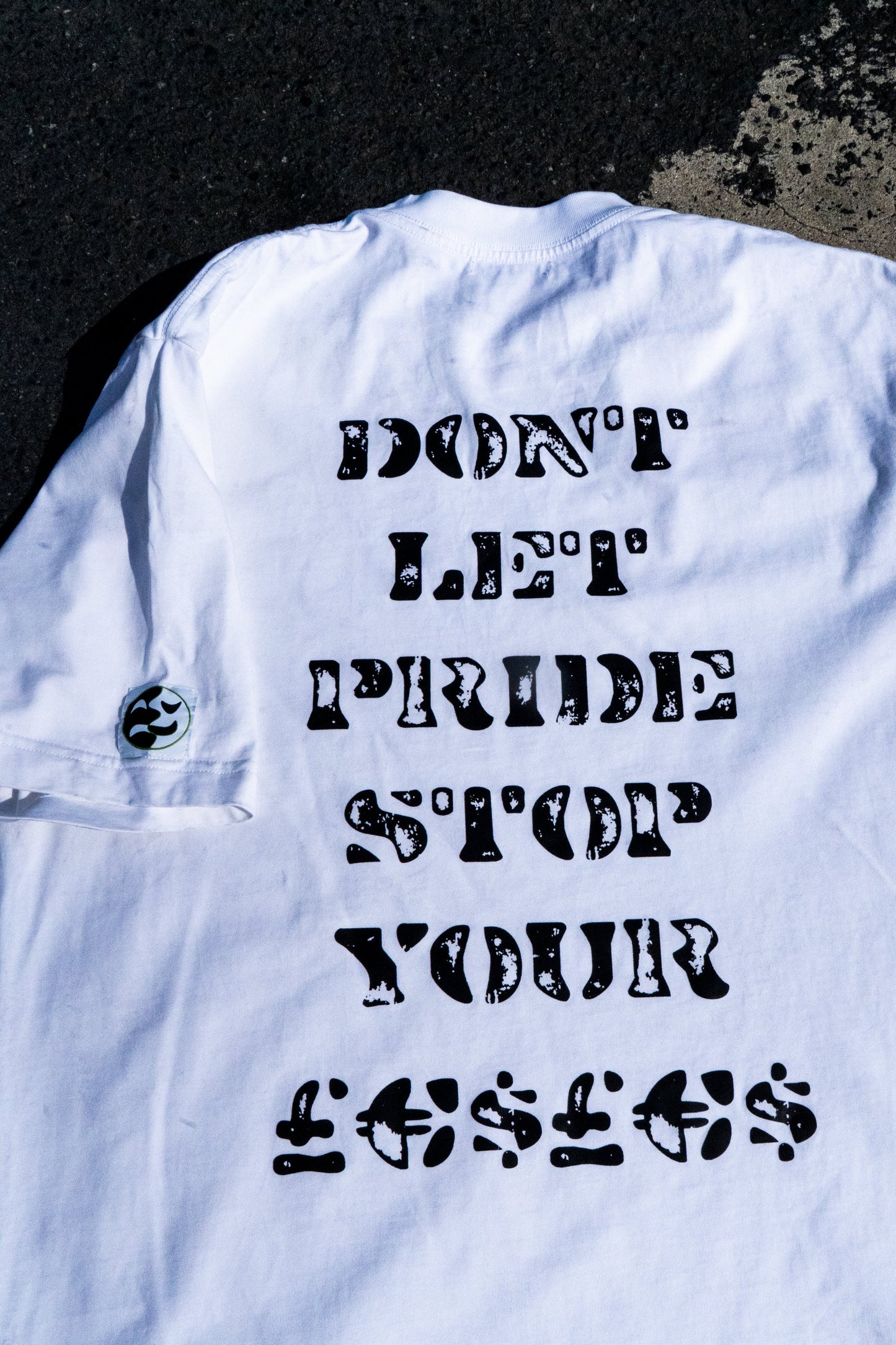 RiseNGrind White Graphic T-shirt (Don't Let Pride Stop Your Money)
